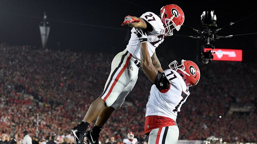 Nick Chubb and Isaiah Wynn of the Georgia Bulldogs celebrate after a touchdown in the 2018 College Football Playoff Semifinal Game against the Oklahoma Sooners at the Rose Bowl Jan. 1, 2018 in Pasadena. UGA went on to win in a double OT nailbiter.