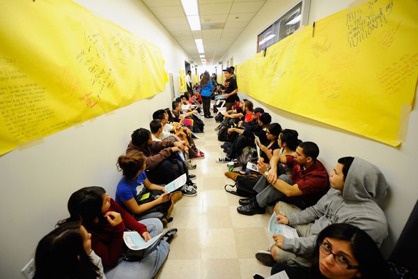 Student sitting indoors learning education.