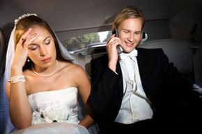 Groom talking on cell phone