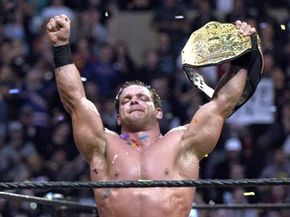 Chris Benoit wins the Triple Threat World Title Match. See more sport pictures.