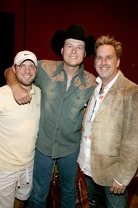 Tour managers ensure tours run smoothly. Here Tour manager Brian Pimmon, left, chats with musician Blake Shelton, center, and Brian O'Connell, right.
