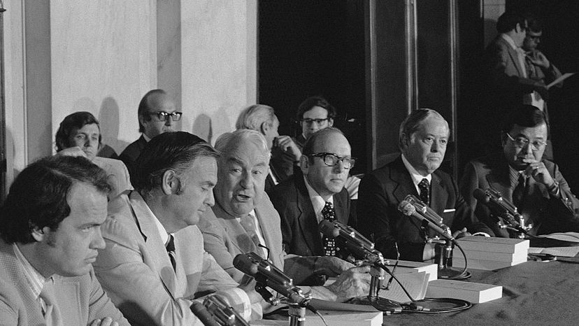 Members and staff of the Senate Watergate Committee gather in the caucus room to deliver their final report on their hearings, July 1974. © Wally McNamee/CORBIS/Corbis via Getty Images