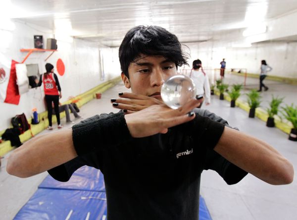 man doing contact juggling