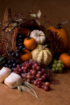 cornucopia filled with pumpkins and gourds