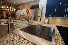 EnviroSLAB takes unusable glass and porcelain and crushes it to make mosaic-style countertops.