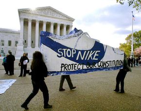 Protest in Washington, D.C., in 2003 over Nike's assertion that as an artificial person, it has a right to use deception under the First Amendment protection of free speech.