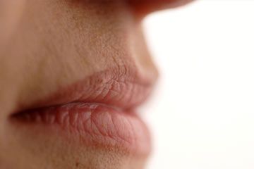 profile of natural lips of a young woman (shallow dof)