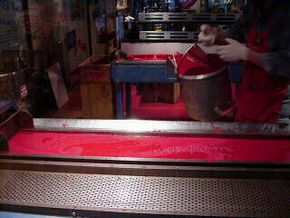 Liquid paraffin in a mold during the crayon manufacturing process. Click picture for a 5-second movie clip.