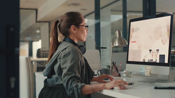 A young designer creating a website in an office