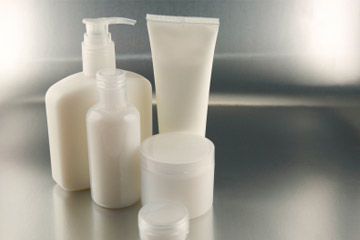 Blank lotion and cream containers.