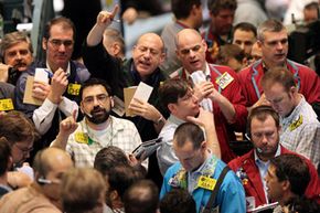 Traders work on the crude oil options pit at the New York Mercantile Exchange on March 11, 2009.