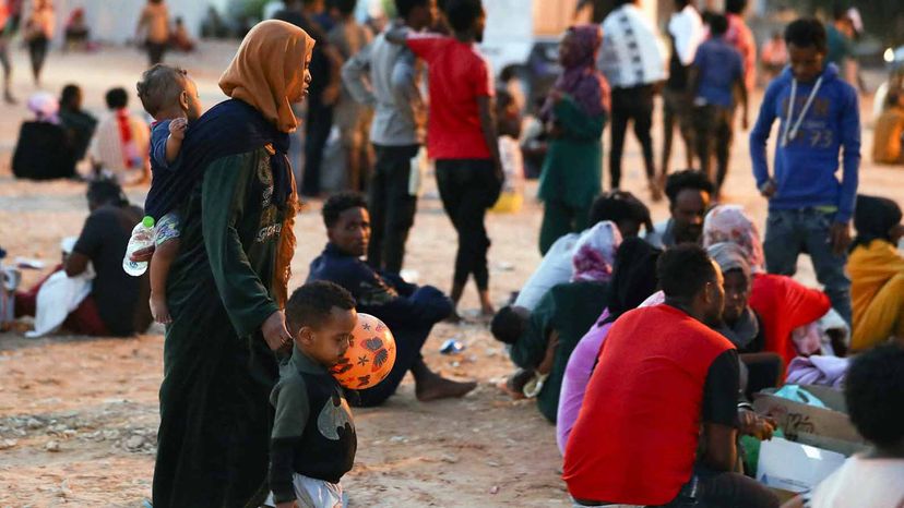 利比亚移民”width=