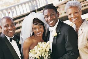 father, bride, groom and mother