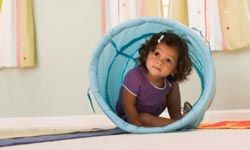 toddler in tunnel