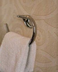 An elegant towel hook is a lovely alternative to a towel rack.