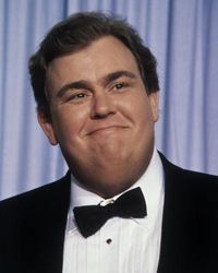 Actor and comedian John Candy in formal dress at the 60th Academy Awards. He presented the Oscar for best achievement in makeup on April 11, 1988 in Los Angeles.