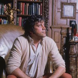 British actor Oliver Reed (1938 - 1999) in his ex-monastery home, Broome Hall, near Dorking in Surrey.
