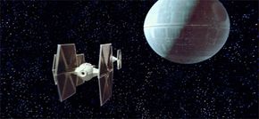A routine TIE Fighter patrol guards the Death Star.