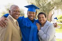 son and parents at graduation