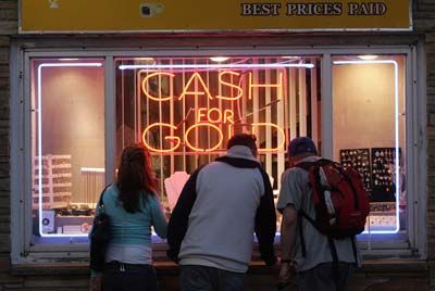 people outside a pawnshop