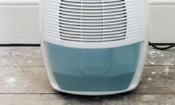 dehumidifier on wood floor