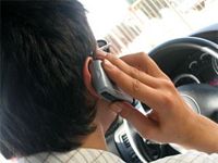 When we're on a cell phone and driving, our attention is divided. Déjà vu may work the same way.