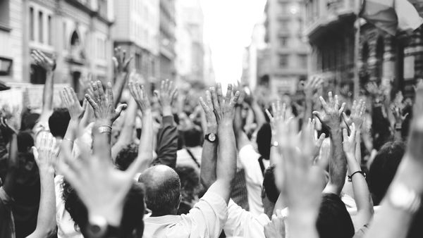 people raising hands