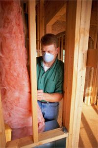 Unlike this guy, you probably want to wear gloves if you're going to install fiberglass insulation.