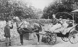Author Charles Dickens (1812-1870) pictured with his wife, Catherine Dickens (1815-1879), and two of their daughters, seated in a horsedrawn carriage, circa 1850.