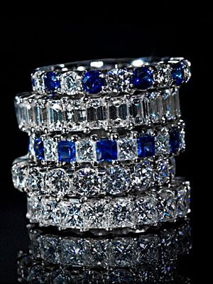 stack of diamond and sapphire infinity bands