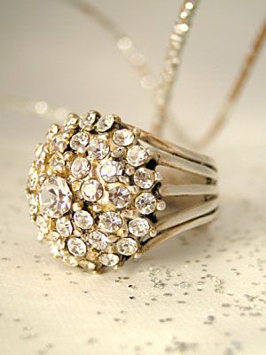 gold diamond engagement ring with little diamonds