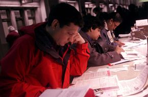 Filing your taxes at the last minute -- or even late -- is better than not filing at all. These tax payers filed at the very last minute in Manhattan in 2000.