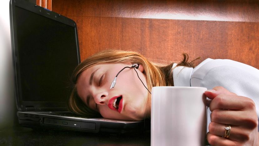 woman at computer asleep