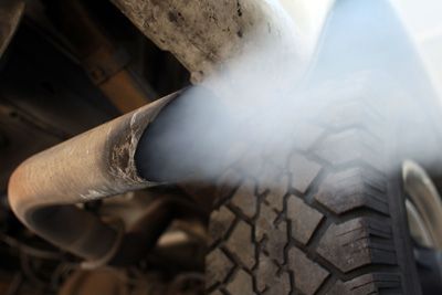 Exhaust flowing out of a tailpipe