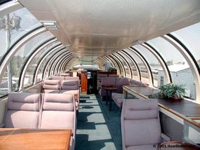 For first-class passengers on this train, there is an observation car that has a sunroom upstairs and a bar.