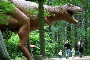 Right now, the closest people can get to realistic dinosaurs are movie screens, fossils and life-sized models, like this one at Dinosaur Park. See more dinosaur pictures.