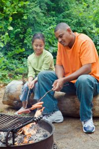 hot dogs over the fire pit