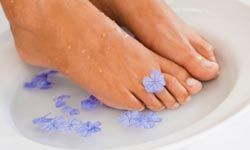 Soaking your feet for about 10 minutes will soften them without making them pruneish.