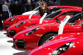 A brand new Porsche is expensive to insure -- but that has nothing to do with the red paint.