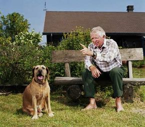 Senior man talking to dog