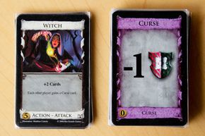 The Witch card and the Curse card from Dominion.