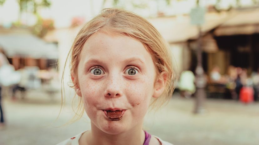 girl eating chocolate