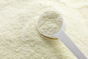 Powdered milk is created through a dehydrating process called spray drying.