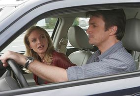 Corinna (Kristin Lehman) and Alex (Nathan Fillion) partner up to participate in the underground road race.