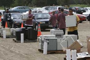 People in Encino, Calif., took advantage of the WorldFest 2006 Earth Day celebration by dropping off their old electronics for a local company to recycle.“border=