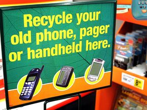 Recycling programs, like this one for small electronic devices at Staples, encourage shoppers to empty their junk drawers of old phones and pagers.