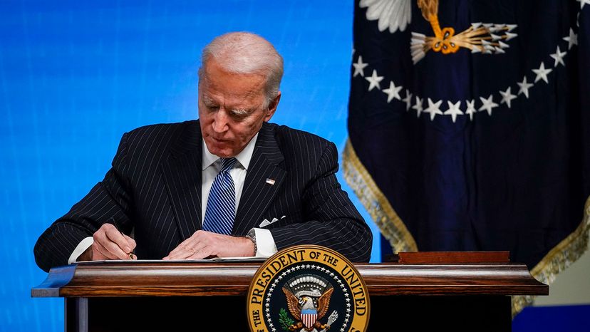 Joe Biden signing executive order