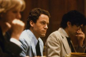 Ted Bundy, seated in court with his lawyers, while on trial for killings of two Florida State University students.