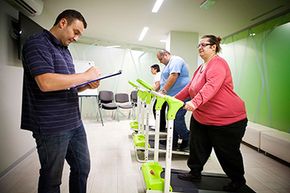 Patients take part in a physical exercise program at an obesity clinic in France. How important is exercise for weight loss?