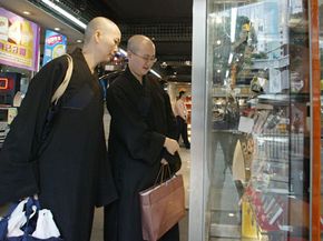 If these Buddhist monks are absent minded, they may want to go for the warranty for whichever phone they purchase.